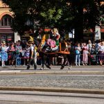 Cultural Horse - a man riding on the back of a black horse