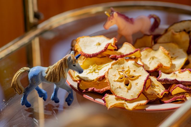 Nutrition Horse - a toy horse is on a plate of food