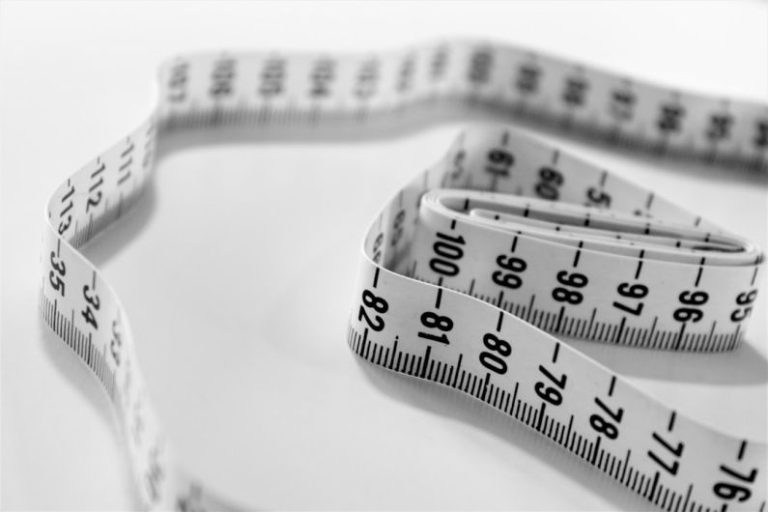 Weight Management - selective focus photography of tape measure
